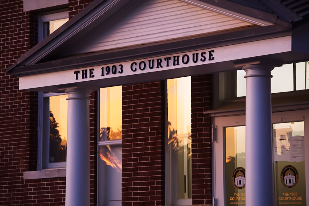 Historic courthouse exterior at sunset